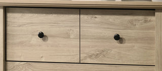 Sunvega Light Oak Finish 4-Drawer Chest with Black Metal Handles