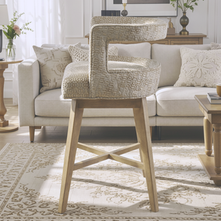 Sunvega Contemporary Swivel Counter Stool with Bronze Metal Kickplate and Wheat Finish