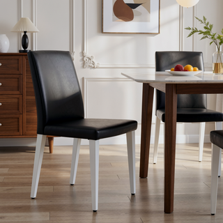 Sunvega 4-Pack Black PU Dining Chairs with Ergonomic Buckle Backrest and Silver Legs