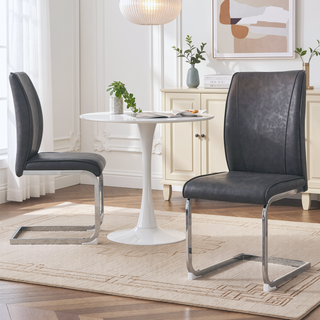 Sunvega PU Dining Chairs with Arched Metal Silver Legs and Crazy Horse Texture in Dark Gray
