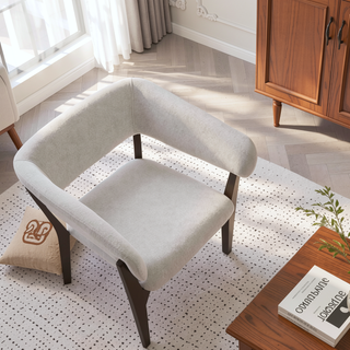 Sunvega Modern Dining Armchair with Sculptural Frame and Ergonomic Backrest